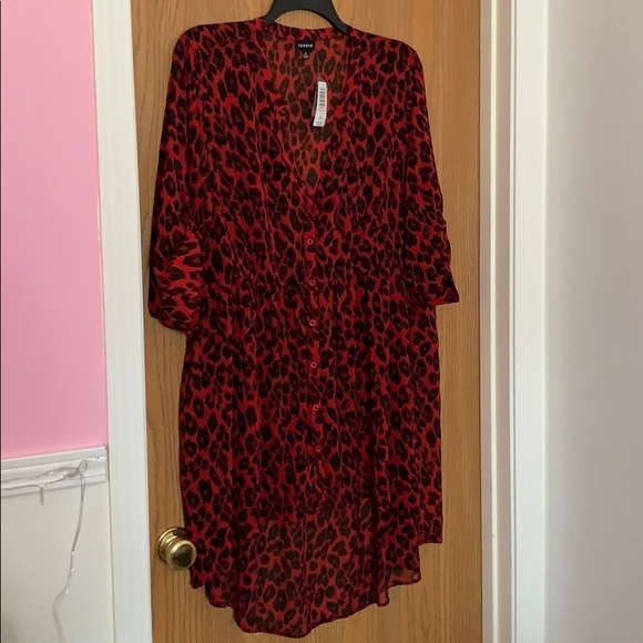 torrid Tops - Adorable cheetah print blouse!